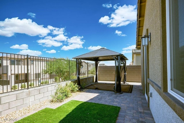 9740 Redwood Cascade St, Las Vegas, NV 89143 - fenced backyard featuring a gazebo and a patio
