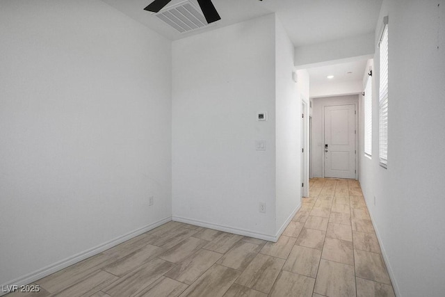 9740 Redwood Cascade St, Las Vegas, NV 89143 - spare room with ceiling fan and wood tiled floors