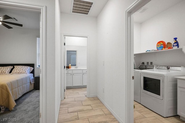 9740 Redwood Cascade St, Las Vegas, NV 89143 - washroom featuring a ceiling fan and separate washer and dryer