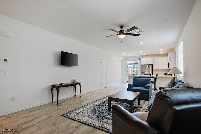 9740 Redwood Cascade St, Las Vegas, NV 89143 - living area with ceiling fan, light wood-type flooring, and recessed lighting