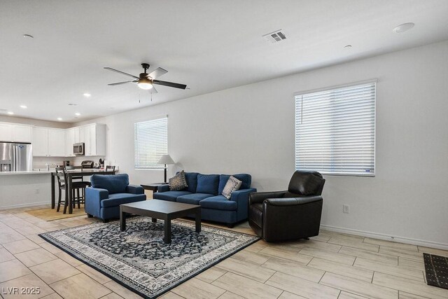 9740 Redwood Cascade St, Las Vegas, NV 89143 - living room featuring a ceiling fan and recessed lighting