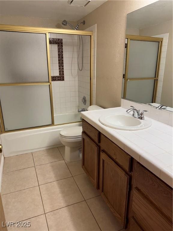4231 Sanderling Cir Unit 267, Las Vegas, NV 89103 - full bath featuring vanity, bath / shower combo with glass door, and tile patterned floors