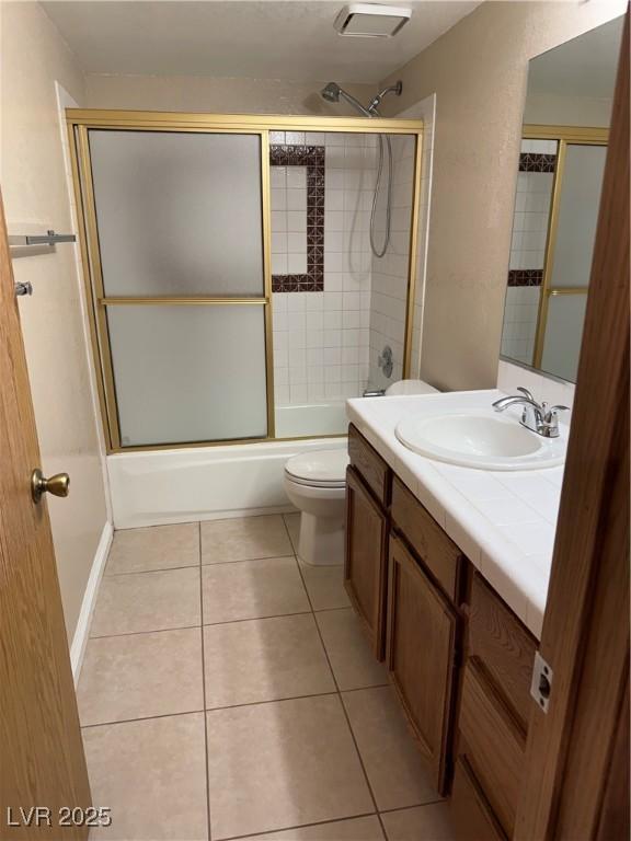 4231 Sanderling Cir Unit 267, Las Vegas, NV 89103 - bathroom with vanity, shower / bath combination with glass door, and tile patterned flooring