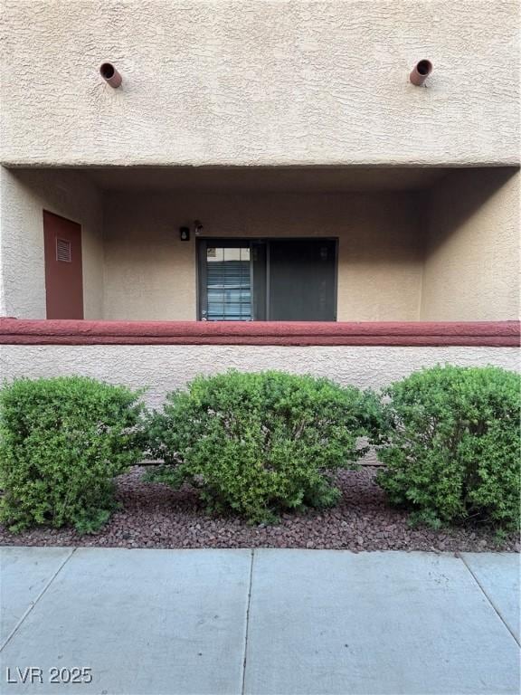 4231 Sanderling Cir Unit 267, Las Vegas, NV 89103 - view of side of property featuring stucco siding
