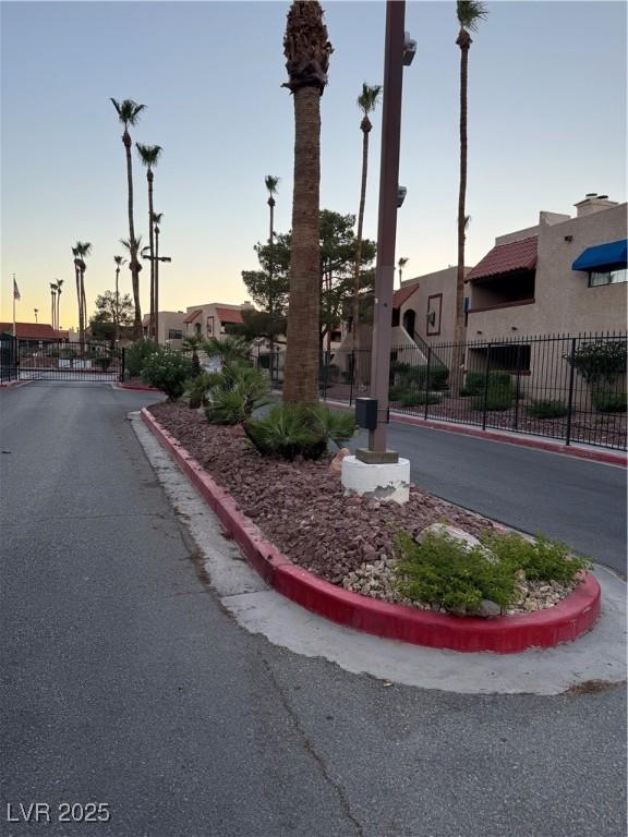 4231 Sanderling Cir Unit 267, Las Vegas, NV 89103 - view of asphalt street featuring curbs and a gated entry