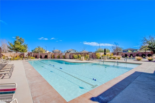 10633 Mount Blackburn Ave, Las Vegas, NV 89166 - community pool featuring a patio area