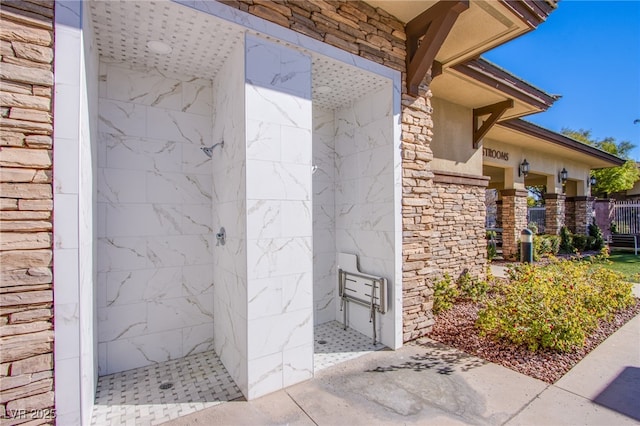 10633 Mount Blackburn Ave, Las Vegas, NV 89166 - property entrance featuring stone siding