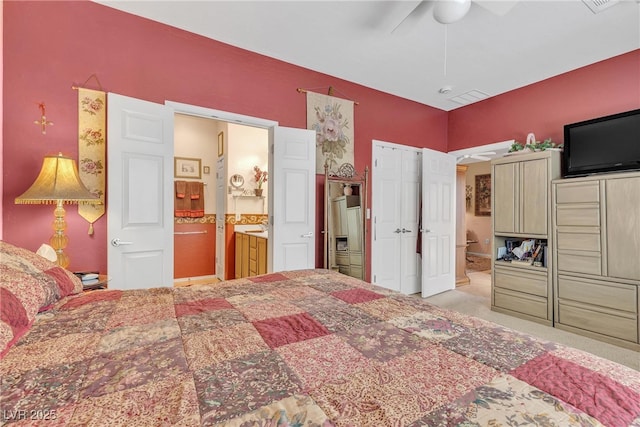2404 Willow Wren Dr, North Las Vegas, NV 89084 - carpeted bedroom featuring ensuite bath and a ceiling fan