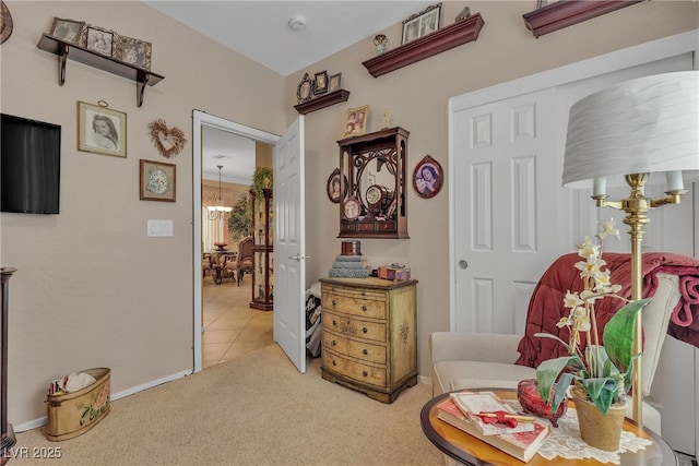 2404 Willow Wren Dr, North Las Vegas, NV 89084 - sitting room with a chandelier, carpet, and tile patterned floors