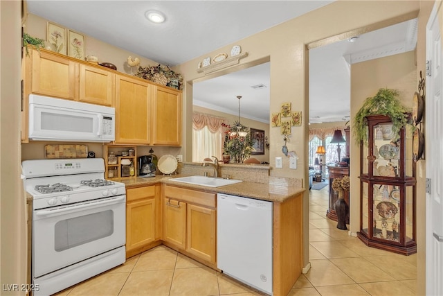 2404 Willow Wren Dr, North Las Vegas, NV 89084 - kitchen with white appliances, light tile patterned floors, light brown cabinets, pendant lighting, and ornamental molding