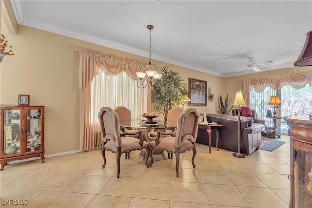 2404 Willow Wren Dr, North Las Vegas, NV 89084 - dining space with ornamental molding, light tile patterned floors, a chandelier, and a ceiling fan
