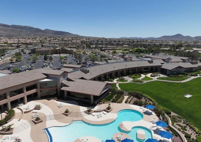 2404 Willow Wren Dr, North Las Vegas, NV 89084 - drone / aerial view of mountains and a pool