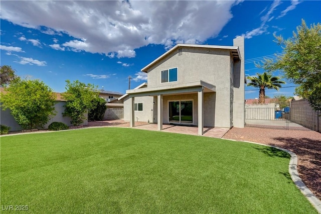 730 Arrowhead Trl, Henderson, NV 89002 - rear view of house featuring a fenced backyard, a patio area, stucco siding, and a chimney