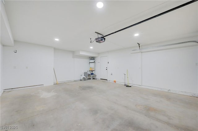 730 Arrowhead Trl, Henderson, NV 89002 - garage with a garage door opener, water heater, and recessed lighting