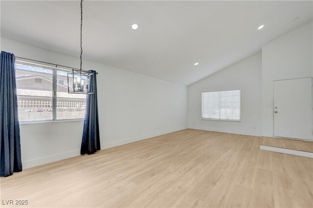 730 Arrowhead Trl, Henderson, NV 89002 - unfurnished room with lofted ceiling, light wood-style floors, a chandelier, and recessed lighting
