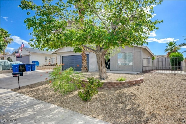 730 Arrowhead Trl, Henderson, NV 89002 - view of front facade with a garage and a gate
