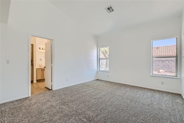 4616 Silversword Ave, North Las Vegas, NV 89032 - empty room featuring light colored carpet and baseboards