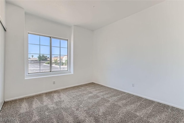 4616 Silversword Ave, North Las Vegas, NV 89032 - empty room featuring carpet flooring and baseboards