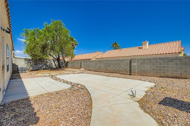 4616 Silversword Ave, North Las Vegas, NV 89032 - fenced backyard featuring a patio