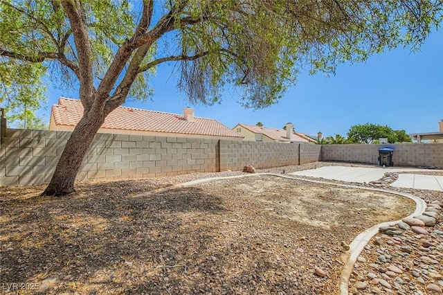4616 Silversword Ave, North Las Vegas, NV 89032 - fenced backyard with a patio area