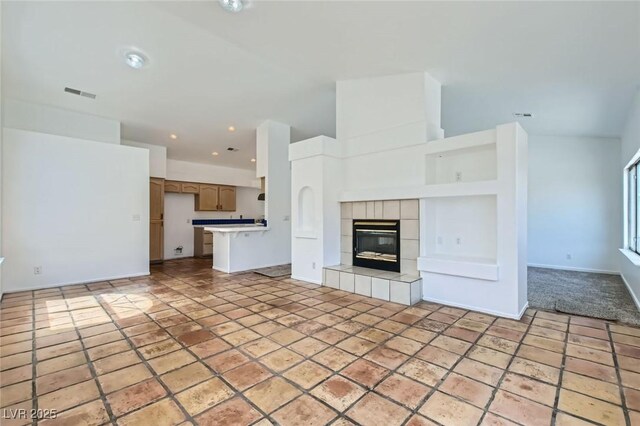 4616 Silversword Ave, North Las Vegas, NV 89032 - unfurnished living room featuring a fireplace and recessed lighting