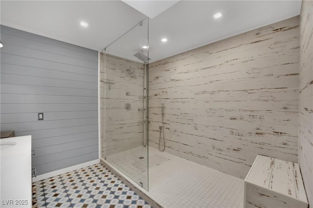 3080 Yankee Clipper Dr, Las Vegas, NV 89117 - bathroom featuring wood walls, a tile shower, recessed lighting, and vanity