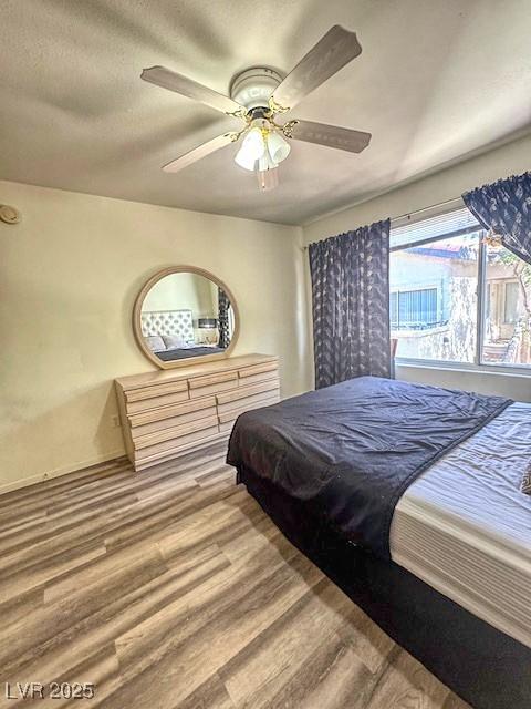 3101 Casey Dr Unit 204, Las Vegas, NV 89120 - bedroom featuring wood finished floors and ceiling fan