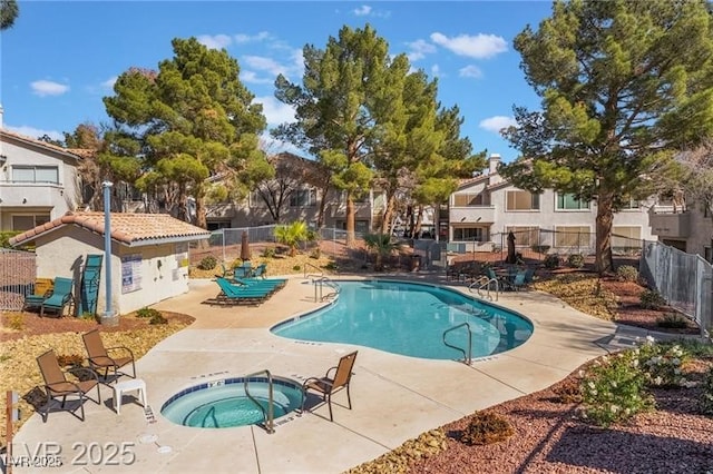 3101 Casey Dr Unit 204, Las Vegas, NV 89120 - community pool with a hot tub, a patio area, and a residential view