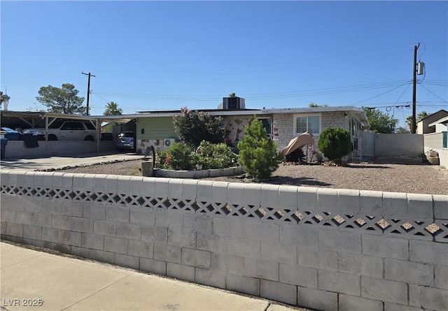 1692 Palora Ave, Las Vegas, NV 89169 - view of front of house with a carport