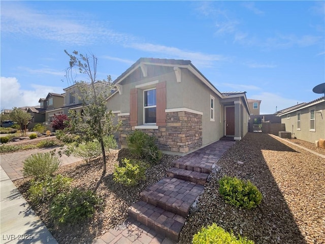 3499 Brezine Ave, Henderson, NV 89044 - view of front facade with stone siding and stucco siding