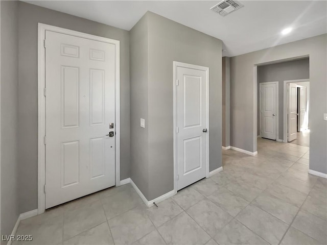 3499 Brezine Ave, Henderson, NV 89044 - foyer with baseboards and light tile patterned floors