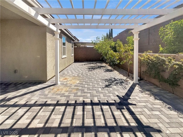 3499 Brezine Ave, Henderson, NV 89044 - fenced backyard with a pergola and a patio