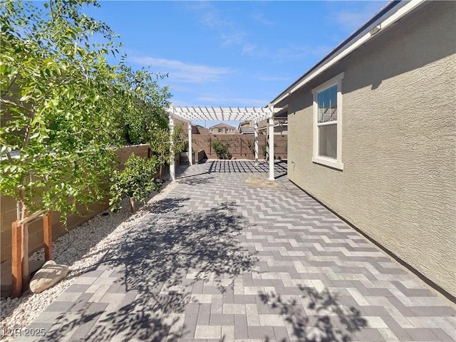 3499 Brezine Ave, Henderson, NV 89044 - fenced backyard with a pergola and a patio
