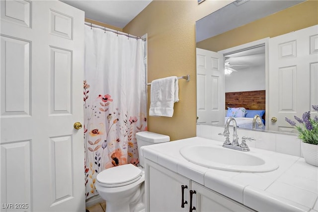 7401 Red Swallow St, Las Vegas, NV 89131 - full bath featuring vanity, ensuite bath, a ceiling fan, and curtained shower