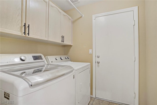 7401 Red Swallow St, Las Vegas, NV 89131 - laundry area with separate washer and dryer and cabinet space