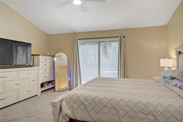 7401 Red Swallow St, Las Vegas, NV 89131 - bedroom with light colored carpet, access to outside, lofted ceiling, and a ceiling fan