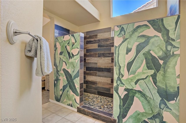 7401 Red Swallow St, Las Vegas, NV 89131 - bathroom featuring tiled shower and tile patterned floors