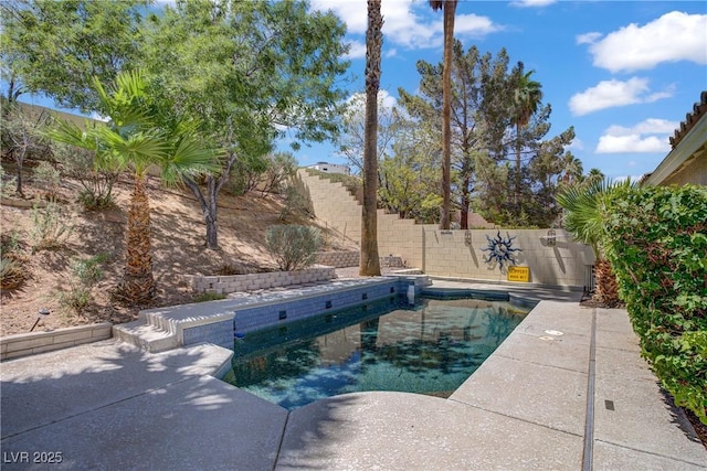 7401 Red Swallow St, Las Vegas, NV 89131 - view of swimming pool featuring a fenced backyard