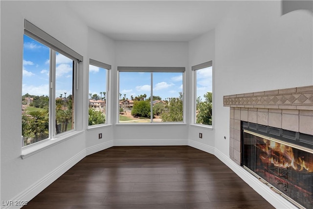 56 Grossinger Ct, Henderson, NV 89074 - unfurnished sunroom featuring wood finished floors and baseboards