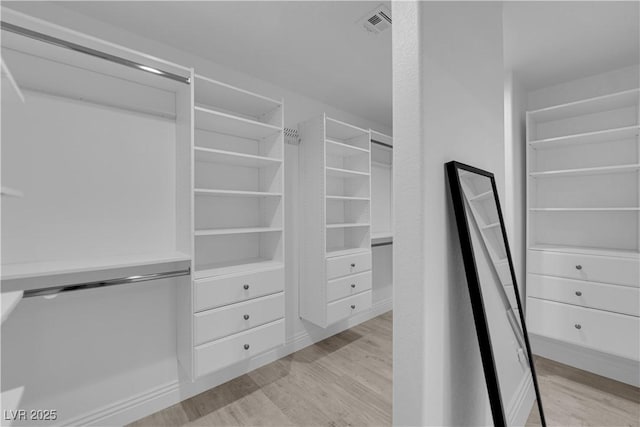 56 Grossinger Ct, Henderson, NV 89074 - spacious closet featuring light wood-style flooring