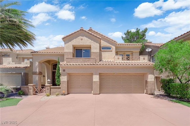 56 Grossinger Ct, Henderson, NV 89074 - view of front of property with a garage, driveway, a tile roof, and a balcony