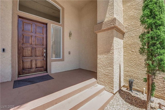 56 Grossinger Ct, Henderson, NV 89074 - property entrance featuring stucco siding