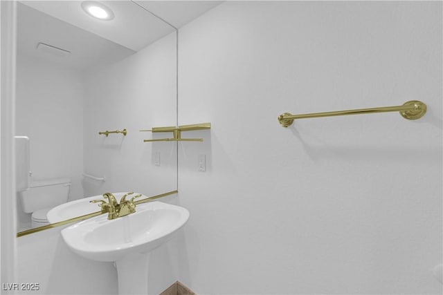 56 Grossinger Ct, Henderson, NV 89074 - bathroom featuring toilet and recessed lighting