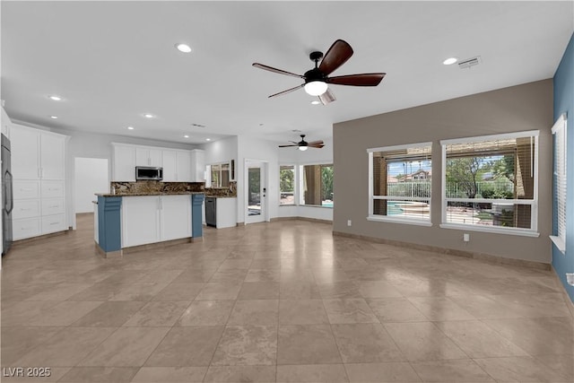 56 Grossinger Ct, Henderson, NV 89074 - unfurnished living room with ceiling fan, light tile patterned flooring, and recessed lighting