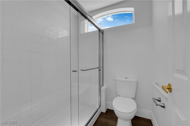 56 Grossinger Ct, Henderson, NV 89074 - bathroom featuring a shower stall and wood finished floors