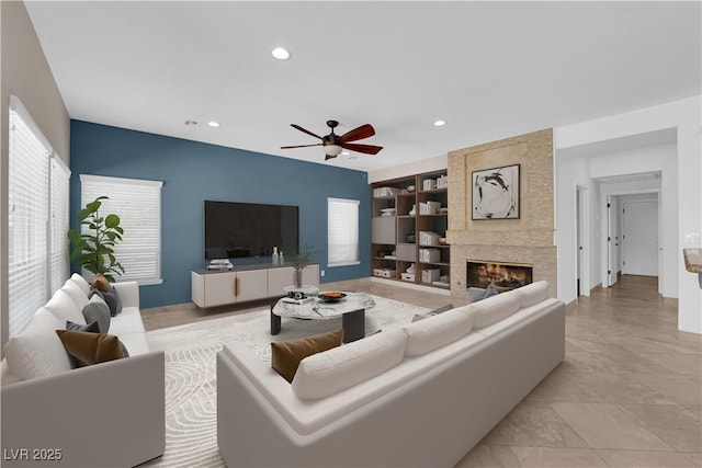 56 Grossinger Ct, Henderson, NV 89074 - living room with a ceiling fan, recessed lighting, and a large fireplace