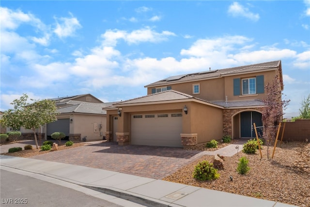 7107 Calvert Cliffs St, North Las Vegas, NV 89084 - traditional home featuring stucco siding, stone siding, and solar panels