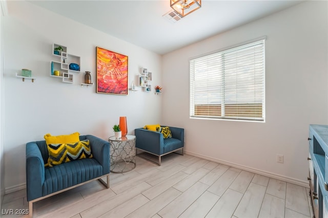 7107 Calvert Cliffs St, North Las Vegas, NV 89084 - living area featuring baseboards and wood finish floors