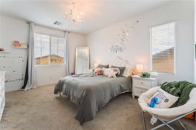 7107 Calvert Cliffs St, North Las Vegas, NV 89084 - bedroom featuring a chandelier and light colored carpet