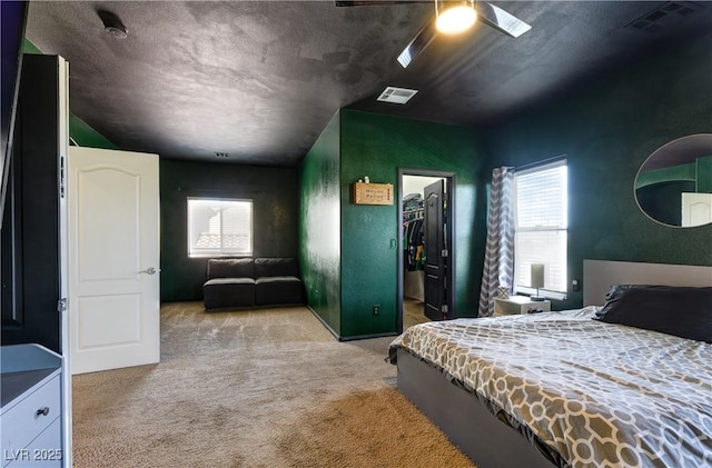 8169 Skytop Ledge Ave, Las Vegas, NV 89178 - bedroom with carpet flooring, a spacious closet, and ceiling fan